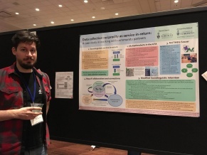 Derek with poster "Data Collection Reciprocity as service-in-return"